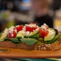 Avo Greek · Freshly smashed avocado, topped with mixed greens, avocado slices, cherry tomatoes, feta che...