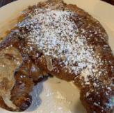 French Toast  · Toasty croissant dipped in our special cinnamony homemade french toast recipe.