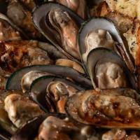 Saldanha Bay Mussels · Mussels are so beloved in South Africa, they are one of the country’s top exports and best e...