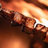 Espetada - Pork Belly · A skewered meat tradition made legendary in South Africa by Portuguese explorers. All orders...