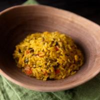 Fragrant Rice · South African-style long grain and wild rice with corn, bell peppers, cilantro and onions se...