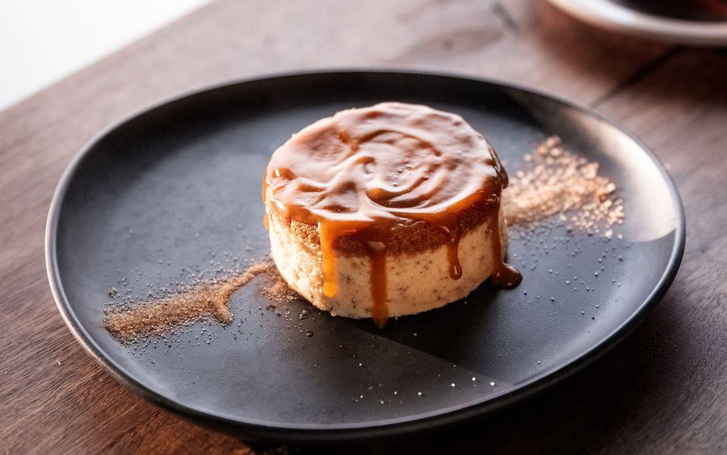 Sticky Toffee Cheesecake · Loaded with sticky toffee chunks, our house-made cheesecake is served upside down and drizzled with sticky toffee sauce.