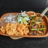 Carne Arrachera · Served with rice, beans and hand made tortillas. Flat iron steak marinated in Morita peppers...
