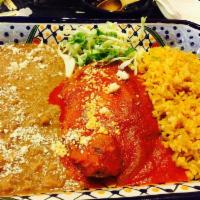 Chile Relleno · Roasted poblano pepper dipped in egg batter & fried. Chile stuffed w/cheese & topped w/tomat...