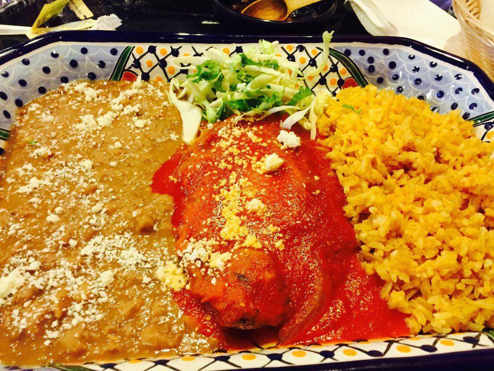 Chile Relleno · Roasted poblano pepper dipped in egg batter & fried. Chile stuffed w/cheese & topped w/tomato & onion sauce.