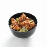 Chicken Karaage Rice Bowl · Juicy chicken karaage doused in special garlic sauce on rice.