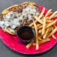 Loaded French Dip Sandwich · Dry rubbed and house braised roast beef piled high with mushrooms, onions, and provolone. Se...