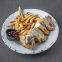 Revenge of the Monte Cristo Sandwich · Pressed ham, turkey, and cheese sandwich dipped in homemade tempura batter and fried golden ...