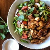 Fattoush Salad · Fresh romaine heart lettuce, tomatoes, cucumbers, peppers, onions, parsley, and radish tosse...