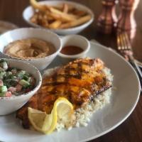 Samkeh Harra Plate · Flamed grilled fish fillet marinated with our house-made Habanero Sauce and Mediterranean he...