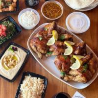 Chicken Feast w/4 Sides · Two whole rotisserie chickens served with your choice of 4 sides!