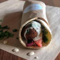 Falafel Veggie Wrap · Falafel wrap with tomatoes, cucumbers, turnips and tahini sauce. Ask to add hummus for $0.55...