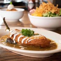 Chile Relleno · jack cheese stuffed poblano pepper, battered & deep fried, smothered with jack cheese, green...