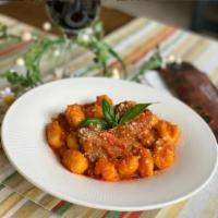 Gnocchi with Beef Sauce · Small dumplings.