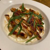 Fettuccine Alfredo with Grilled Chicken  · Rich butter and paremsan sauce.