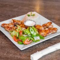Chicken Kebab Entree · Boneless tender pieces of chicken marinated and grilled on a skewer. Served with choice of s...
