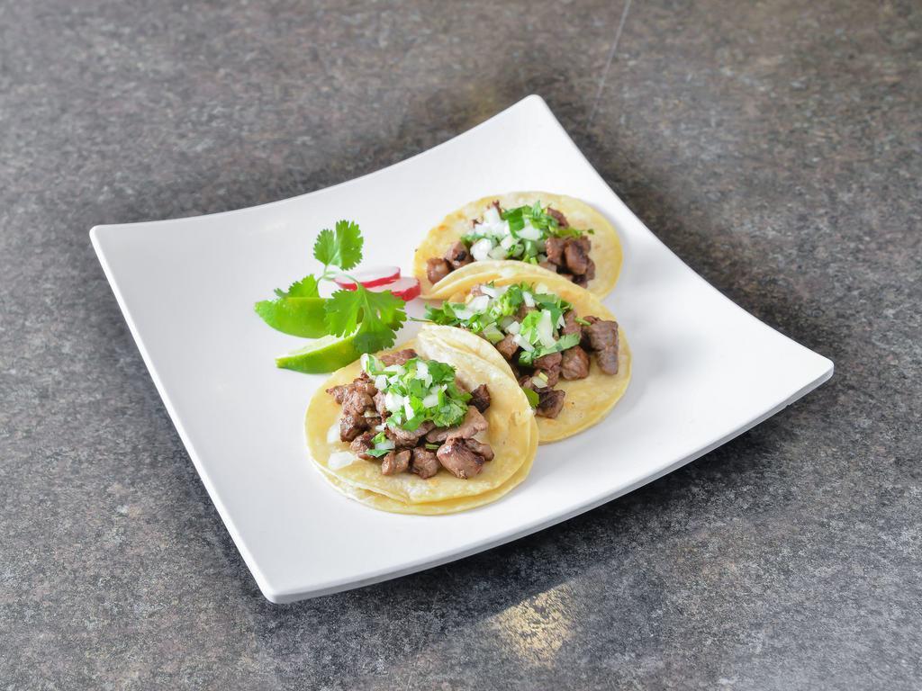 Taco · Soft tacos are served with cilantro, onion, lime, radish, and your choice of meat.