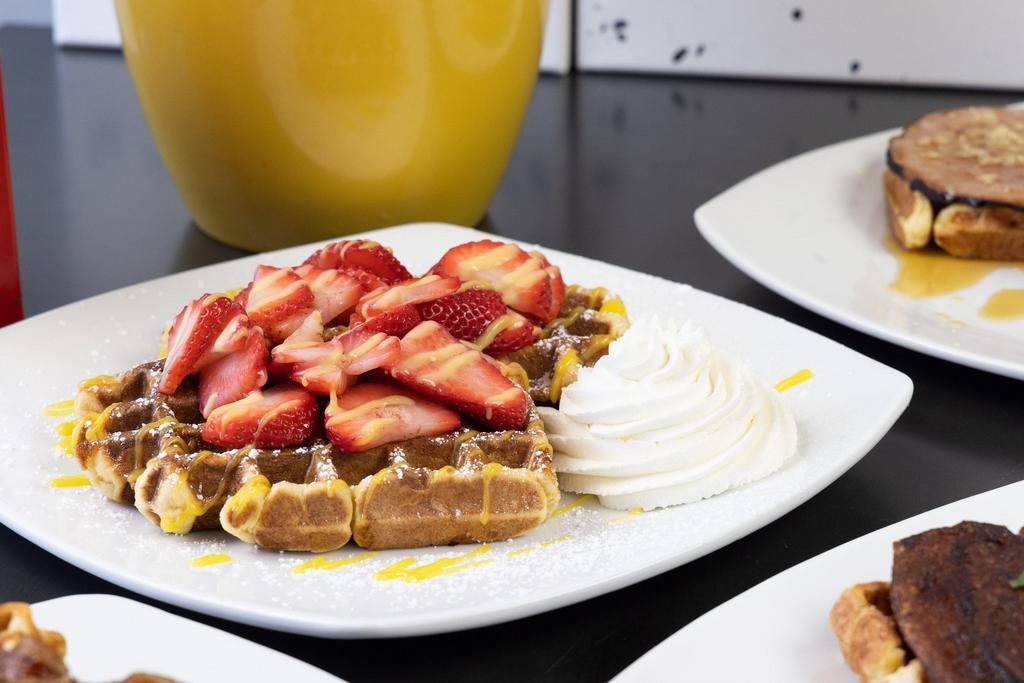 Strawberry and Lemon Curd Waffle · Waffle with Fresh Strawberries, Whipped Cream and Lemon Curd
