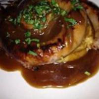 Bangers and mash  · British bangers with mashed potatoes and topped with onion gravy 