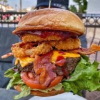 Wild West Burger · Applewood smoked bacon, onion rings, BBQ sauce, cheddar cheese. lettuce, tomato and mayo. Se...