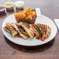 Tuscan Panini · Marinated grilled chicken, fresh mozzarella cheese, roasted peppers and baby spinach.