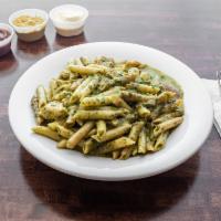 Chicken Penne Pesto · Penne pasta tossed with chicken and fresh tomatoes in our pesto sauce.