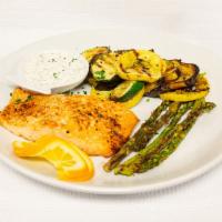 Flame Grilled Salmon · Grilled Atlantic salmon topped with a caper and dill cream spread. Served with potato and gr...