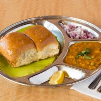 Pav Bhajji · Fresh garden vegetables cooked in tomato gravy with onions, garlic, ginger and served with a...