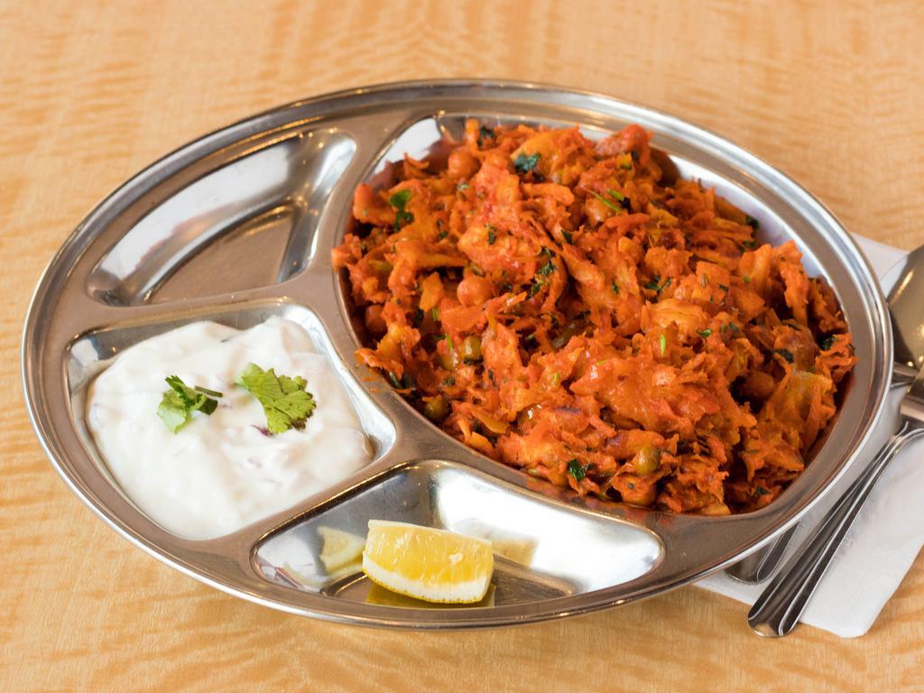 Mixed Vegetable Curry · Boiled vegetables mixed with Indian spices cooked with onion paste and fine Indian spices.