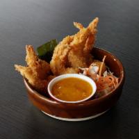 Crispy Tiger Prawns · Eight (8) pieces. Fried tiger prawns coated in panko bread. Served with spicy mango sauce.