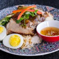 Kamoo · Pork stew. Slow-braised pork. Served with Chinese broccoli, boiled egg, mustard greens, and ...