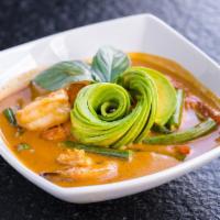 Shrimp Panang Curry (Gluten-Free) · Mildly spiced. Tiger prawns in coconut red curry with peanut sauce, Thai holy basil, red bel...
