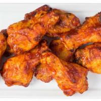 Hot N Spicy Buffalo Chicken Wings · 1lb. of oven-roasted chicken wings tossed in fiery Buffalo sauce.