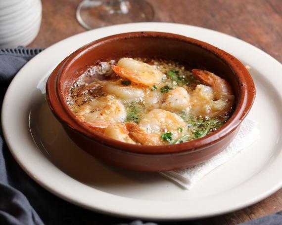 Camarones al Ajillo · Grilled shrimp in garlic sauce.