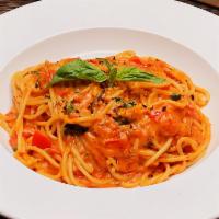 Spaghetti Vodka · Spaghetti pasta with fresh tomato, vodka sauce, and a touch of cream.
