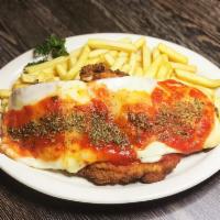Milanesa Napolitana · Breaded beef or chicken with tomato sauce, mozzarella cheese, and ham.