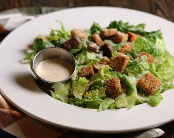 Ensalada Caesar · Caesar salad. Add chicken for an additional charge.