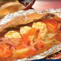 Seafood al Vapor · 8 oz. fresh fish fillet, 3 jumbo shrimp, wrapped in aluminum foil, spices, tomatoes, peppers...