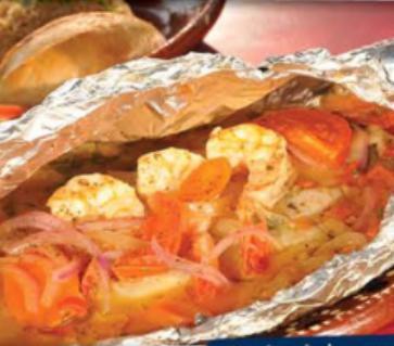 Seafood al Vapor · 8 oz. fresh fish fillet, 3 jumbo shrimp, wrapped in aluminum foil, spices, tomatoes, peppers, cilantro, and butter lemon sauce.