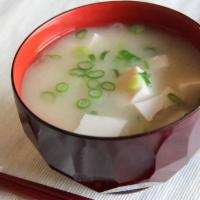 A1. Miso Soup · Soybean paste soup with tofu and wakame seaweed sprinkled with spring onion