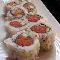 S12. *Spicy Tuna Roll · Raw tuna fish seasoned with spicy sauce, avocado and crunchy flakes with spicy mayonnaise.