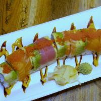 S13. *Rainbow Roll · California roll topped with assorted raw fish, avocado and masago