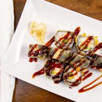 S16. Golden Bagel Roll · Deep fried roll with salmon, cream cheese ＆ avocado, topped with unagi sauce