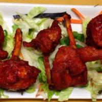 4 Piece Chicken Lollipop · 4 piece marinated chicken lollipops, breaded and tossed with sweet chili sauce or Szechuan h...