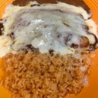 Enchiladas de Mole · 3 chicken enchiladas covered with mole sauce and Monterey cheese. Served with rice and beans.