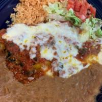 Chile Relleno · 1 poblano pepper stuffed with beef or cheese, topped with Mexican sauce and Monterey Jack ch...