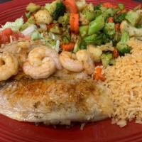 Tilapia & Shrimp · A tilapia fillet and shrimp grilled in a buttery wine sauce with our savory spices. Served w...