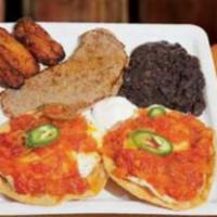 Huevos Rancheros · Over easy eggs with tomato based sauce, steak, beans, sweet plantains, sour cream, and torti...