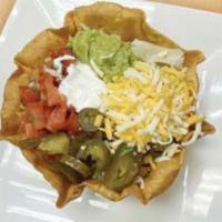 Azteca Crispy Salad · Crispy flour tortilla bowl. Served with your choice of meat. Grilled or sauteed, rice, beans...