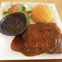 Enchiladas · Soft folded tortillas, stuffed with chicken or steak and covered with sauce of choice: green...
